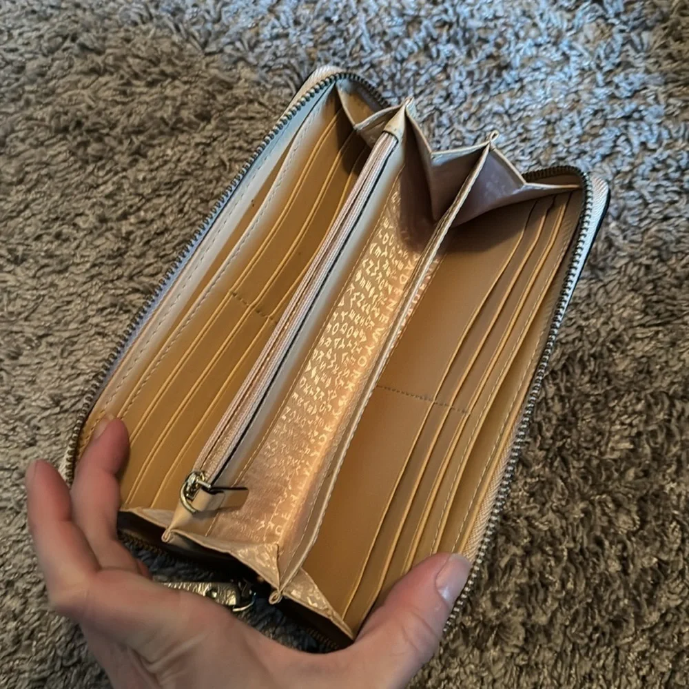 Like new gold Kate Spade zip wallet